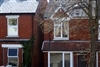 House prices 7% higher than year before, despite monthly drop